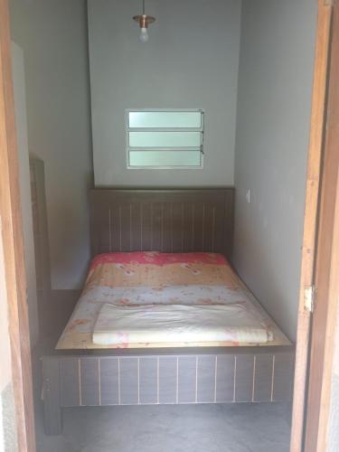 Postel nebo postele na pokoji v ubytování Chácara Cachoeira