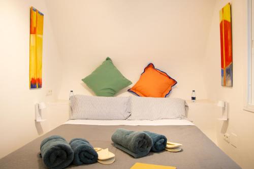 En eller flere senge i et værelse på Colmena 69 - City Center - Swimming pool