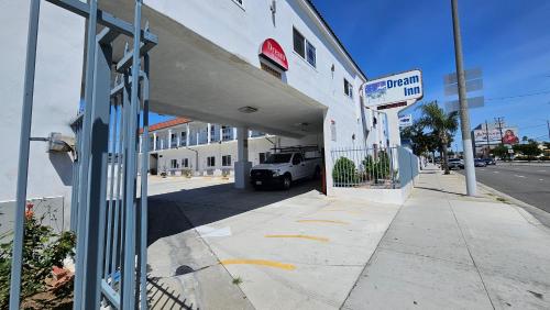 a gas station with a truck parked outside of it at Dream Inn in Inglewood