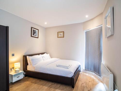 Ένα ή περισσότερα κρεβάτια σε δωμάτιο στο Studio flat