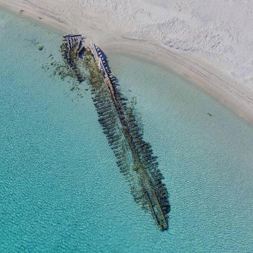 an aerial view of a dock in the water at Da Marta Appartamento VISTA MARE MOZZAFIATO ISOLA ROSSA in Cascabraga