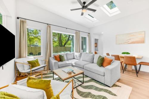 a living room with a couch and a table at New-Dog Friendly,Hot Tub, Fire-pit, 1 mile to DTWN in St. Augustine