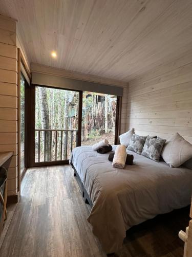 Postel nebo postele na pokoji v ubytování Alto los Pilos