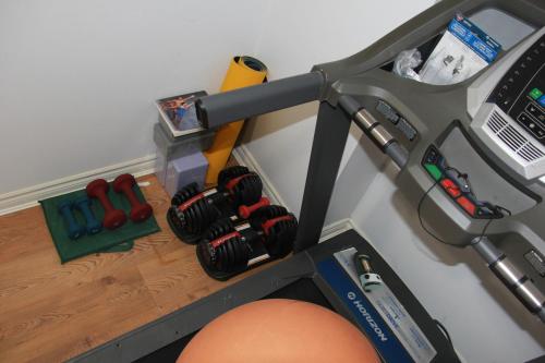 a shelf with a bunch of tools on a table at Serene Don River Nature gateway- 2BR suite, Private Patio, Free Parking in Toronto