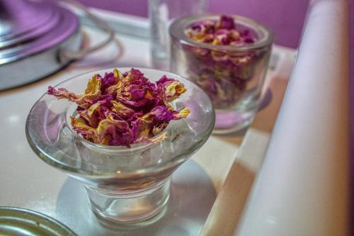 a glass bowl of food on a table at Lamtounipalace in Ouarzazate