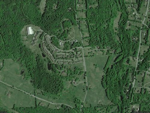 an overhead view of a field with a river at Windham Ridge Chalet in Windham