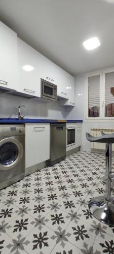 a kitchen with a sink and a dishwasher at VISTA GÓTICA CATEDRAL BURGOS Spain in Burgos