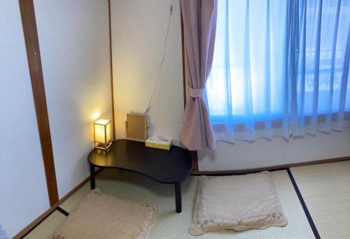 Katil atau katil-katil dalam bilik di 大阪三姐妹天下茶屋館 Three Sisters Lodge -Tengachaya