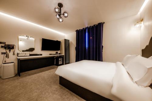 Katil atau katil-katil dalam bilik di Hotel Miin