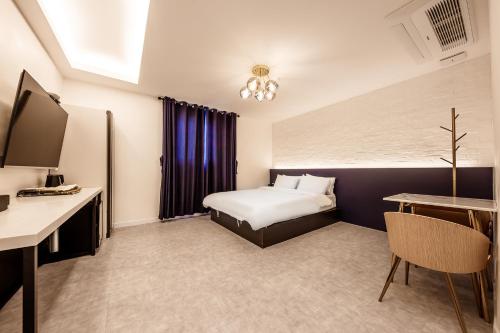 Televisyen dan/atau pusat hiburan di Hotel Miin