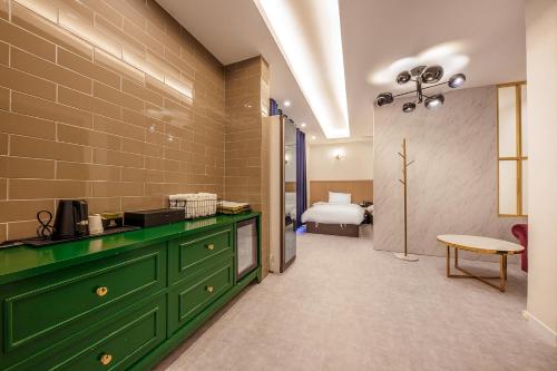 Katil atau katil-katil dalam bilik di Hotel Miin