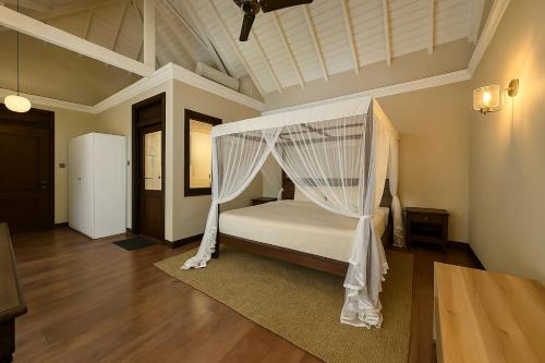 Una cama o camas en una habitación de Teal Villa