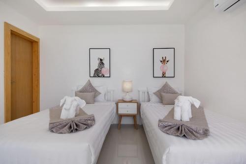 Katil atau katil-katil dalam bilik di Villa The Wave