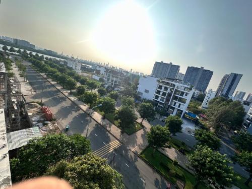 an aerial view of a city street with tall buildings at I Riverside B303 I Compact & Quiet Studio in Ho Chi Minh City