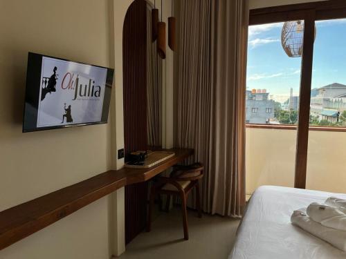 TV a/nebo společenská místnost v ubytování Oh!Julia Hotel Komodo