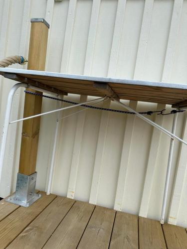 a table on top of a room with a wall at Apartment with terrace Nasinge 4F in Strömstad