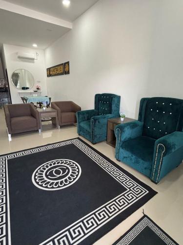Χώρος καθιστικού στο Homestay Che Ani