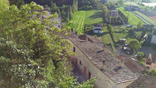 an aerial view of a village with houses and trees at Borgo San Valentino in Arrone