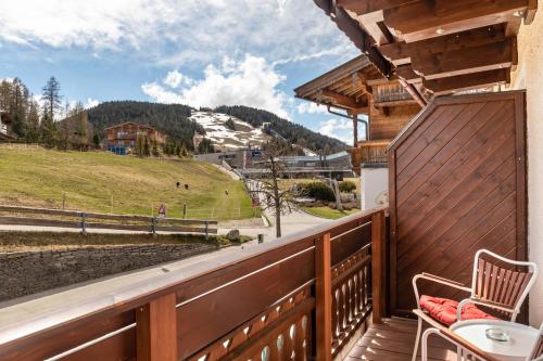 a balcony with a view of a mountain at Chalet Sonneck - Seefeld in Seefeld in Tirol