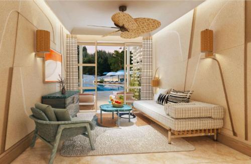 a living room with a couch and a chair at Hilton Istanbul Bosphorus in Istanbul