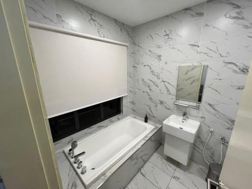Koupelna v ubytování Imperio Homestay by ENM GROUP