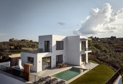 Akra Villa, a Cliffside Escape with Pure SeaViews, By ThinkVilla