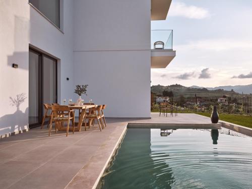 Akra Villa, a Cliffside Escape with Pure SeaViews, By ThinkVilla