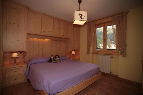 Ένα ή περισσότερα κρεβάτια σε δωμάτιο στο Appartamenti Cercenà Deluxe