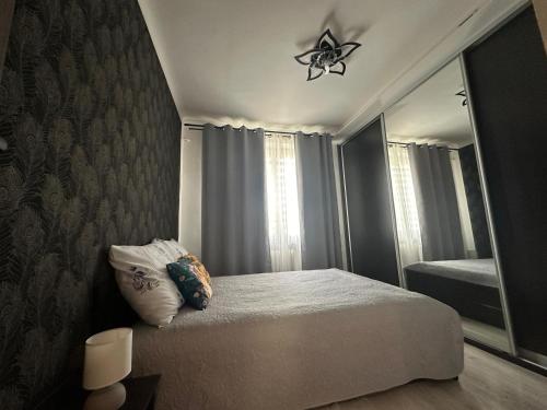 Posteľ alebo postele v izbe v ubytovaní Centrum Apartment Lipowa 12