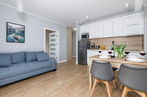 Stylish Apartment Rybacka with Parking by Noclegi Renters