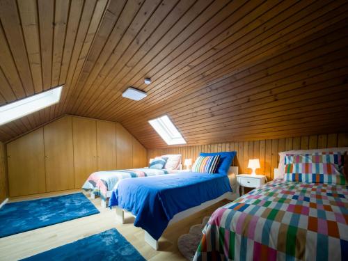 Postel nebo postele na pokoji v ubytování Wolf Apartments-Spittal