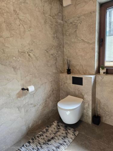 Un baño de Lazy House Latvia