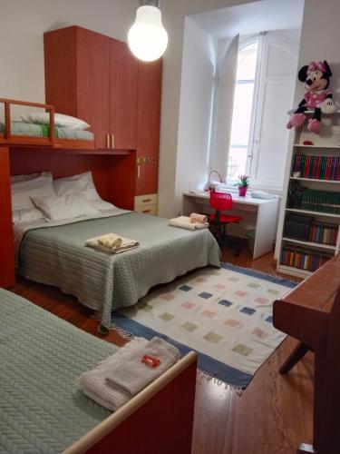 Private room by an Italian family - A unique experience close to Colosseum, the Roman Forum and Basilica Saint Mary Major