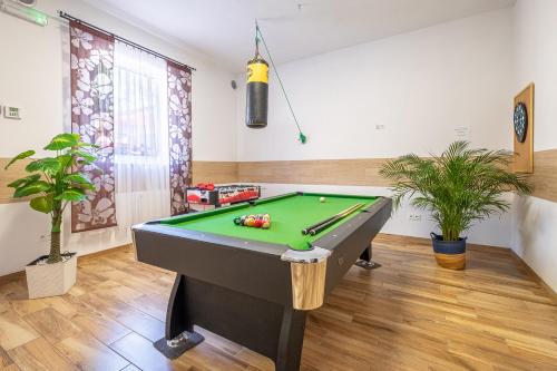 a billiard room with a pool table in it at Caro - Blisko Morza Łeba in Łeba