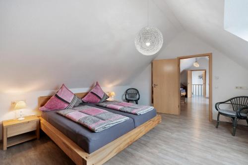 Postel nebo postele na pokoji v ubytování Maisonette Ferienwohnung mit 90qm