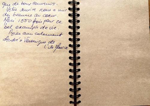 a piece of paper with a handwritten letter at maison Rose & Jardinier eco homestay in Sa Pa