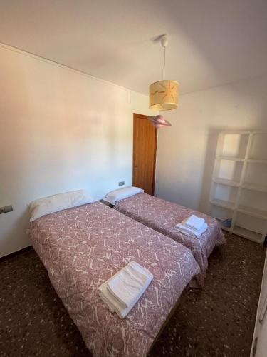 Postel nebo postele na pokoji v ubytování Ulldemolins Niuet