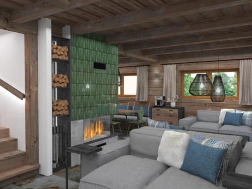 a living room with a couch and a fireplace at Resort Drevenice Terchova in Terchová