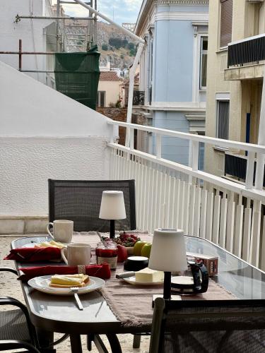 Living near Acropolis by Sylvia Staikou 2nd & 3d floor