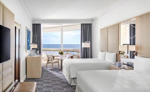 TV a/nebo společenská místnost v ubytování Fairmont Monte Carlo