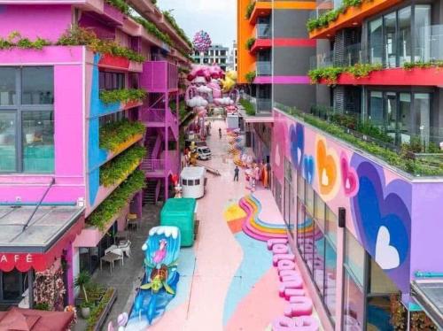 a view of a building with a water park at Flamingo Hai Tien in Nam Khê