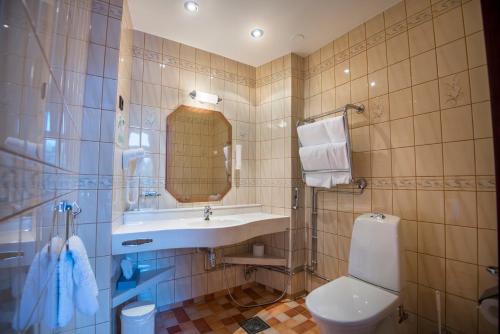 Koupelna v ubytování Hotel Astor