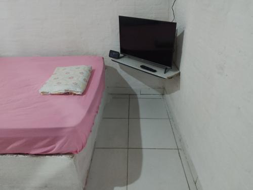 Μια τηλεόραση ή/και κέντρο ψυχαγωγίας στο Casa pertinho do centro