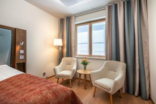 Кровать или кровати в номере Hotel Vallonia