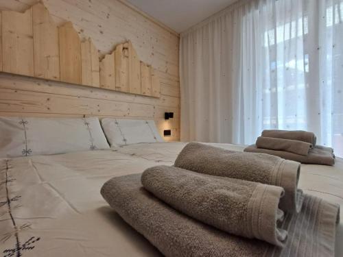 Ένα ή περισσότερα κρεβάτια σε δωμάτιο στο Mountain & Lodge