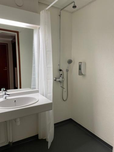 Ένα μπάνιο στο Hotel & Hostel Tallukka
