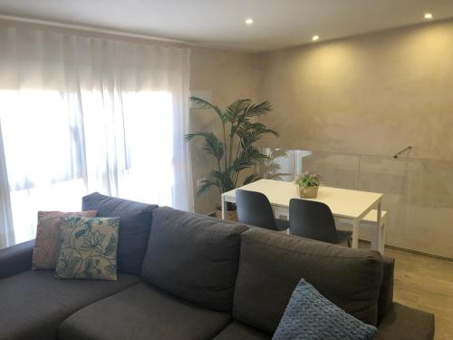 Χώρος καθιστικού στο Niebla Centro Apartamentos