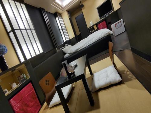 Postel nebo postele na pokoji v ubytování Hotel MGM
