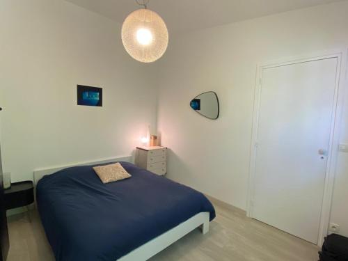 Postel nebo postele na pokoji v ubytování La maison de Stella
