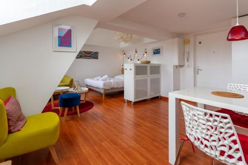 Ένα ή περισσότερα κρεβάτια σε δωμάτιο στο Mésange - Studio au centre de Strasbourg